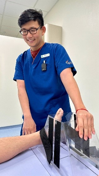 Nuclear Medicine technologist positioning a patient for FFI - SGH