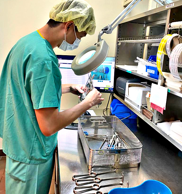  ​Bernard checking the surgical instruments to ensure they are working properly and not chipped. This keeps our patients safe.  