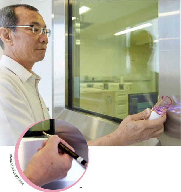  David using a vapour spray (above) and smoke pen (left) to check that air is not escaping from a negative-pressure lab.  