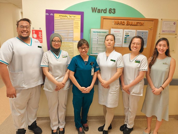  NC Ye Li Zhen with her colleagues who worked with her on the 'This is me – Care Passport'. (from left) SSN Shaik Yazeed; ANC Nadhirah Binte Hassan; Dr Rachel Ng, Consultant, Geriatric Medicine; NC Ye Li Zhen; NC Julian Lee; Pharmacist Tan Yi Hua; Physiotherapist Joachim Lee 