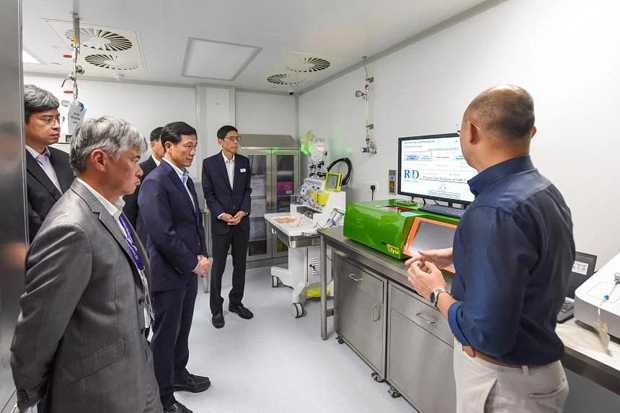  ​Minister for Health Ong Ye Kung during the tour of the new Advanced Cell Therapy and Research facility on Aug 4. ST PHOTO EUGENE TAN 