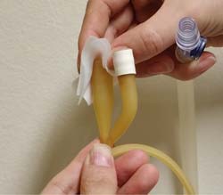change urine bag - clean urine catheter connector